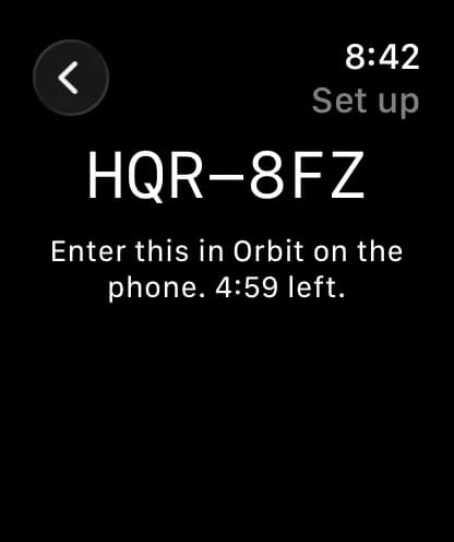 The watch's setup screen: a six-character code and how long it stays valid.